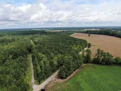 Aerial view of property and surrounding area with rural landscape