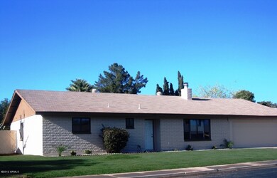 FRONT OF HOME WITH NEW FRESH LAWN