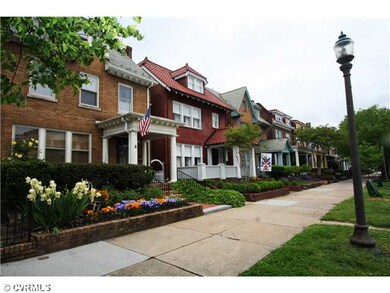 Exterior Front - Renovated homes line the block, w