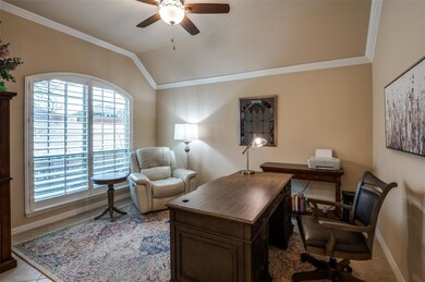 Office featuring ceiling fan, lofted ceiling, orna
