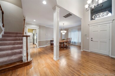 Beautiful dental molding in the foyer and formal d