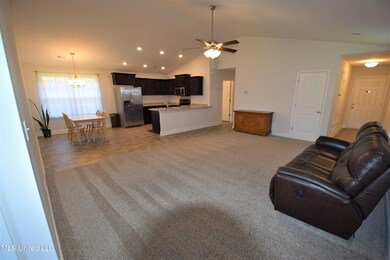 Great Room with view into Kitchen