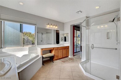 Master Bath features dual vanities with dual sinks