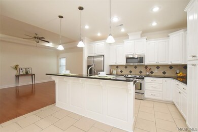 Granite counter tops and custom tile backsplash