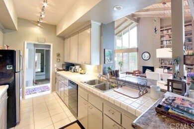 Kitchen looking out toward living room, dining are
