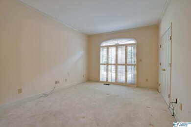 Master bedroom on 1st floor with en suite and access to patio.