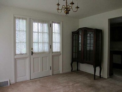 Dining Room. Light and bright with door to cozy si