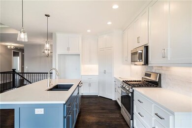 1304 SW Sapperton Rd, Raymore, MO 64083 - photo 7