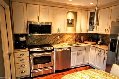 Granite countertops, backsplash, and kitchen table
