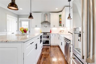 Octagonal gourmet kitchen with plenty of natural light.