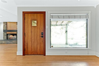 Large picture windows throughout.