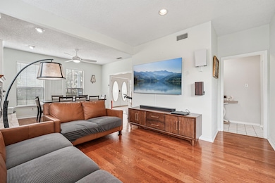 Living area featuring light wood finished floors,