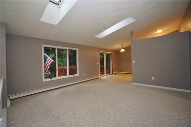 Top of the entry stairs. Coat closet behind you.