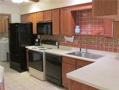 Kitchen. NEWER KITCHEN WITH PLENTY OF CABINET, PANTRY, CONVENIENT TO LAUNDRY RM AND GARAGE