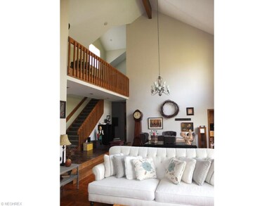 View of great room, formal dining room and catwalk