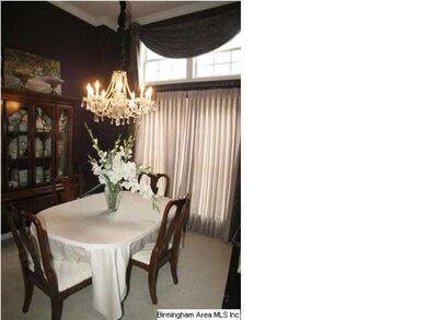 Formal Dining Room features Soaring Ceilings and F