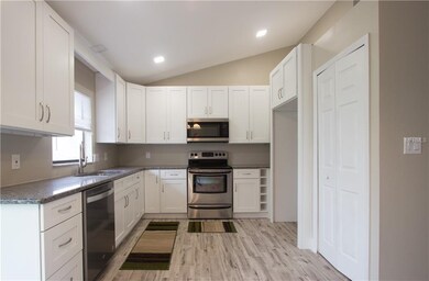 Solid wood 42 high cabinets, granite countertops, new dishwasher,microwave and garbage disposal