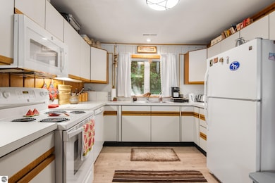 1070 U S 31, Kewadin, MI 49648 - photo 6