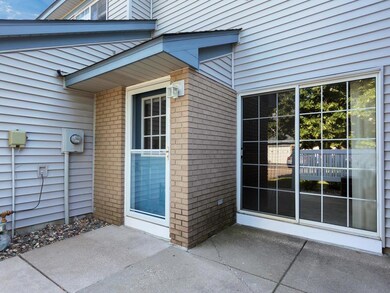 Another view of the front door and patio.