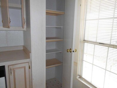 SMALL PANTRY IN KITCHEN