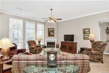 Another view of the living room with gas log firep