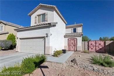 Mediterranean / spanish-style house featuring a ti