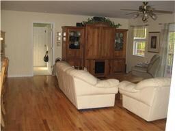 Huge open living area with hardwood floors