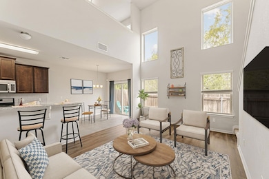 Living room featuring light wood-type flooring, a