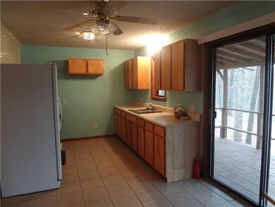 Kitchen. Kitchen with sliders to back covered deck.