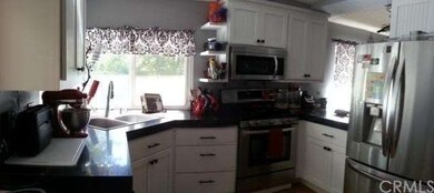 Kitchen with granite counters, stainless steel app