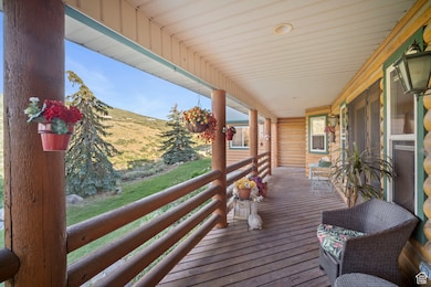 Wooden deck featuring a mountain view