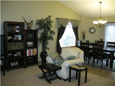 Living room with adjacent dining room