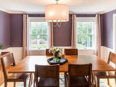The dining room with lovely trim is...