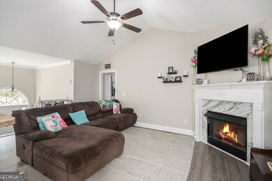Bright and airy living space with vaulted ceilings