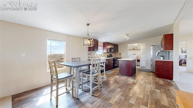 Large dining area looking towards the kitchen