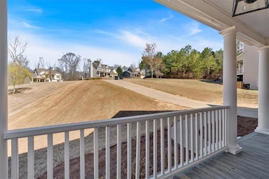 Wooden deck with a yard and a residential view