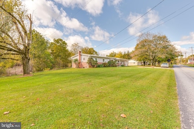 397 Henshaw Rd, Bunker Hill, WV 25413 - photo 4