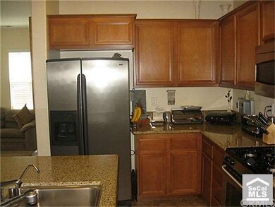 Upgraded cabs, granite counters and SS appliances.