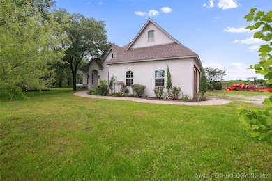 View of property exterior featuring roof with shin