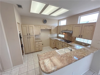 Kitchen is open with tons of natural light