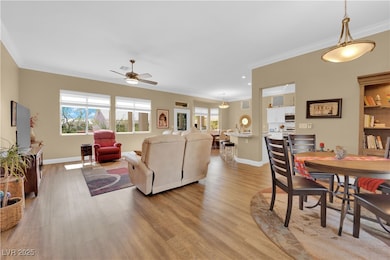 Living area featuring light wood finished floors,