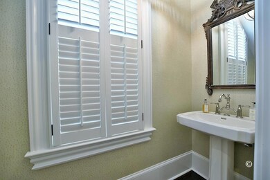 Powder room behind the secret door under staircase