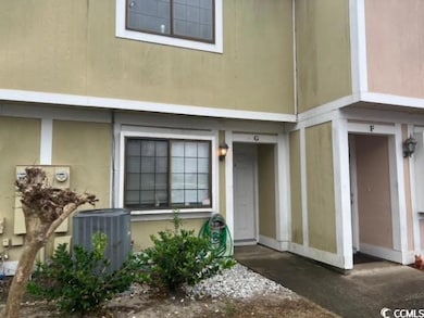 Doorway to property with central air condition uni