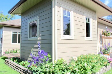Landscaping trims the house perimeter