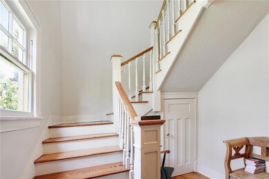 ENTRANCE- STAIRWELL TO UPPER UNIT