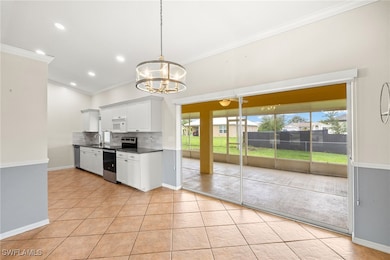 Kitchen with appliances with stainless steel finis