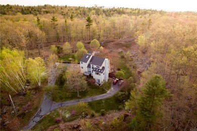 The home sits on top of a hill...
