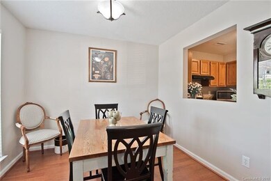 Dining room has pass through window to kitchen!