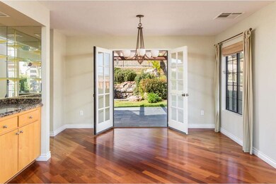 Formal dining room with rear views.