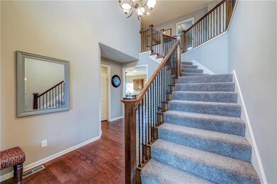 Stunning hardwoods and open entry welcome you to t